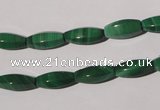 CMN224 15.5 inches 5*12mm faceted rice natural malachite beads