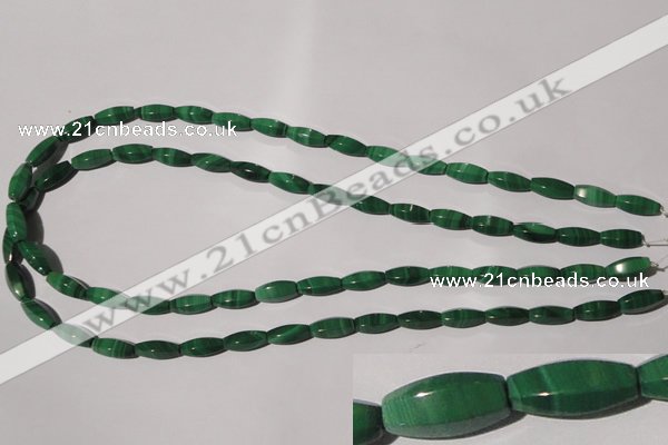 CMN224 15.5 inches 5*12mm faceted rice natural malachite beads