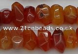 CNG1170 15.5 inches 8*14mm - 10*18mm faceted nuggets carnelian beads