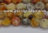 CNG6222 15.5 inches 6mm faceted nuggets yellow crazy lace agate beads