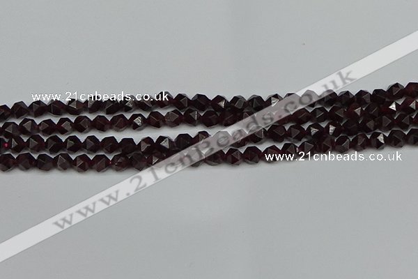 CNG7275 15.5 inches 6mm faceted nuggets red garnet beads