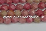 CNG7420 15.5 inches 6mm faceted nuggets rhodochrosite beads