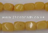 CNG807 15.5 inches 9*12mm faceted nuggets yellow jade beads