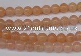 CPE02 15.5 inches 6mm round peach stone beads wholesale