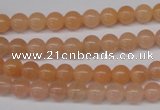 CPE02 15.5 inches 6mm round peach stone beads wholesale