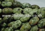 CPS10 15.5 inches 8*12mm rice green peacock stone beads wholesale