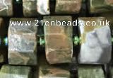 CRB2122 15.5 inches 11mm - 12mm faceted tyre rhyolite gemstone beads