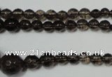 CRO743 15.5 inches 6mm – 14mm faceted round smoky quartz beads