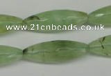 CRU167 15.5 inches 10*30mm faceted rice green rutilated quartz beads