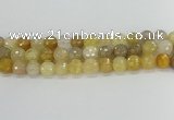 CRU669 15.5 inches 10mm faceted round golden rutilated quartz beads