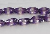 CSA25 15.5 inches 7*12mm faceted rice synthetic amethyst beads