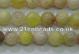 CSS600 15.5 inches 4mm round yellow sunstone gemstone beads