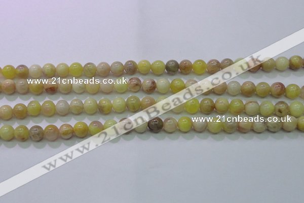 CSS600 15.5 inches 4mm round yellow sunstone gemstone beads
