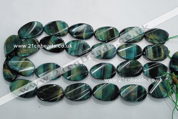 CTE1079 15.5 inches 22*30mm twisted oval dyed green tiger eye beads