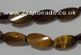 CTE1097 15.5 inches 8*15mm twisted & faceted oval yellow tiger eye beads