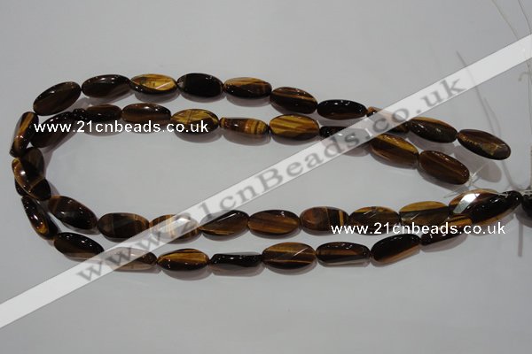 CTE1098 15.5 inches 10*20mm twisted & faceted oval yellow tiger eye beads