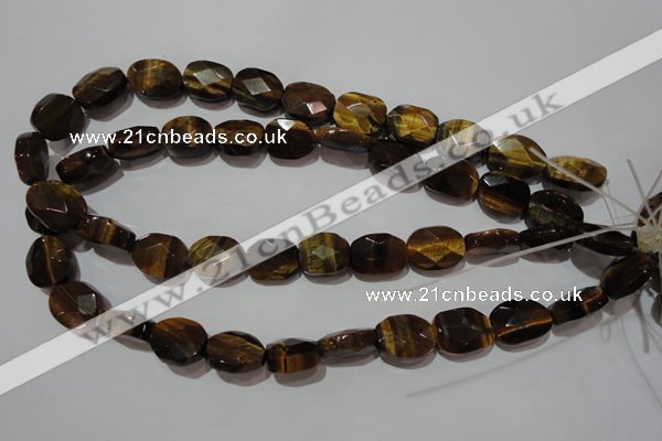 CTE1110 15.5 inches 13*17mm faceted freeform yellow tiger eye beads