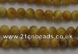 CTE1410 15.5 inches 4mm round golden tiger eye beads wholesale