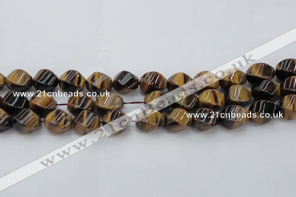 CTE1591 15.5 inches 12*16mm twisted rice yellow tiger eye beads