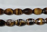 CTE206 15.5 inches 6*8mm faceted rice yellow tiger eye beads