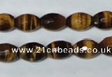 CTE207 15.5 inches 8*10mm faceted rice yellow tiger eye beads