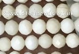 CTG1516 15.5 inches 3mm faceted round white fossil jasper beads