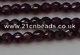 CTG555 15.5 inches 4mm faceted round tiny purple garnet beads