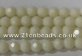 CTU1440 15.5 inches 4mm faceted round synthetic turquoise beads