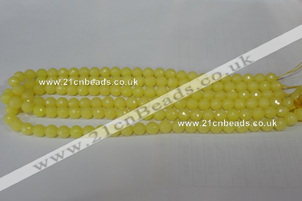 CTU2523 15.5 inches 4mm faceted round synthetic turquoise beads