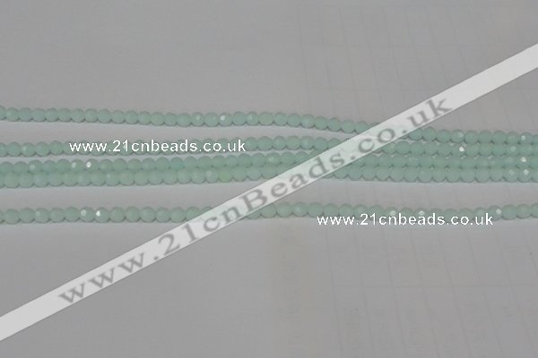 CTU2571 15.5 inches 4mm faceted round synthetic turquoise beads