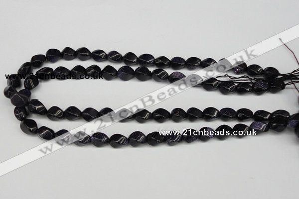 CTW146 15.5 inches 8*11mm twisted rice blue goldstone beads