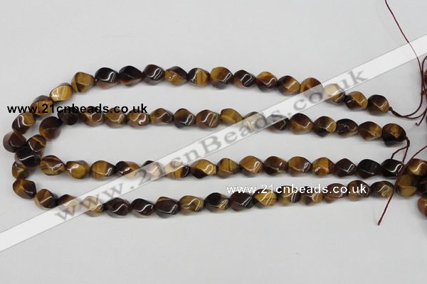 CTW151 15.5 inches 8*11mm twisted rice yellow tiger eye beads