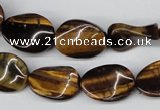 CTW69 15.5 inches 15*20mm twisted oval yellow tiger eye beads