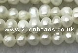 FWP05 14.5 inches 2mm - 2.5mm potato white freshwater pearl strands