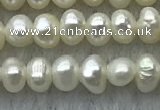 FWP09 14.5 inches 2.5mm - 3mm potato white freshwater pearl strands