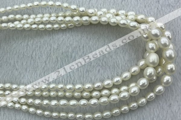 FWP212 15 inches 4mm - 9mm rice white freshwater pearl strands