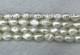 FWP286 15 inches 9mm - 10mm baroque white freshwater pearl strands