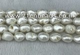 FWP312 15 inches 12mm - 13mm baroque white freshwater pearl strands