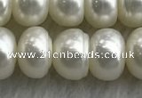 FWP324 15 inches 8mm - 9mm button white freshwater pearl strands