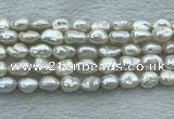 FWP351 15 inches 8mm - 9mm baroque white freshwater pearl strands