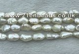 FWP353 15 inches 9mm - 10mm baroque white freshwater pearl strands