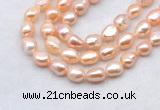 FWP501 14 inches 10mm - 11mm baroque pink freshwater pearl strands